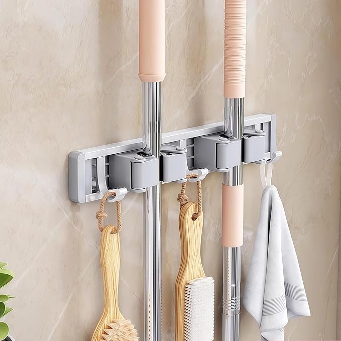 Mop and Broom Holder Wall Mount.Adjustable Tool Organizer Rack with Sliding Hooks, Heavy Duty Drill-Free Broom Hanger for Kitchen, Garage & Laundry Room Storage. (middle)